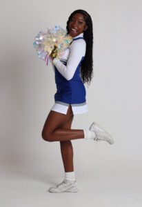 cheerleading uniform and pom-poms