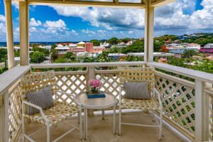 Scenic balcony view overlooking colorful rooftops and Caribbean Sea in the U.S. Virgin Islands