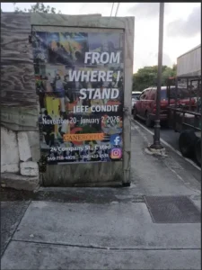 From Where I Stand exhibit poster by Jeff Condit outside Cane Roots Art Gallery in Christiansted.